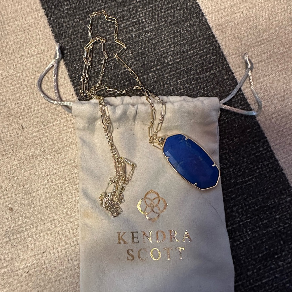 Kendra Scott long necklace with blue blue stone